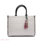 EMBOSSED LOGO TOTE BAG WITH TASSEL CHARM - LARGE