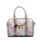 MONOGRAM BARREL BAG WITH CHARM CHAIN - MEDIUM