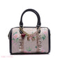 MONOGRAM BARREL BAG WITH CHARM CHAIN - MEDIUM