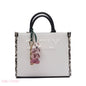 EMBOSSED LOGO TOTE BAG WITH TASSEL CHARM - SMALL